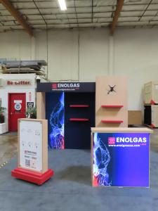 Modified VK-4044 Reconfigurable Inline Exhibit with Shelves, Monitor Mount, Backlit Fabric Graphics, Canopy, Modified MOD-1726 Counter with Locking Storage, and Product Display. Shown w/o LED Video Tiles (Center Section) -- View 3