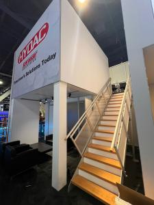 RENTAL: RE-9020 Medium Double Deck Design with Meeting Room with Frosted Acrylic Window Panels, Upper and Lower Walls, Drop Ceiling, (10) Adjustable Can Lights, Staircase Risers, White Unprinted Sintra Insert and Infill Panels, SEG Fabric Graphic for Uppe