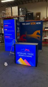 GK-1016 Gravitee Modular Exhibit with SEG Fabric Graphics, SuperNova Lightbox, Monitor Mount, Locking Closet Storage, and GOD-1557 Counter with Locking Storage -- View 4